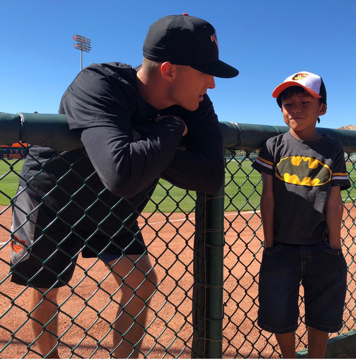Ralston Cash taking some time to chat with a young fan during Orioles camp #TeamCSM