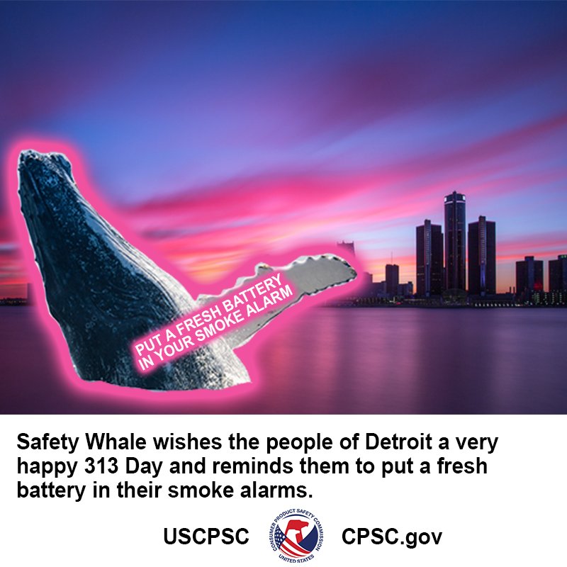 A glowing purple whale sits off the shores of Detroit. The text on their flipper reads, "Put a fresh battery in your smoke alarm." Safety Whale wishes the people of Detroit a very happy 313 Day and reminds them to put a fresh batter in their smoke alarms.