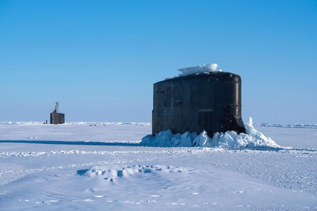 USNavy's tweet photo. #USNavy submarines #USSHartford and #USSConnecticut surface together in #ArcticCircle - https://t.co/gKxbwwdx2q #ICEX 2018 https://t.co/HCiDermqjZ