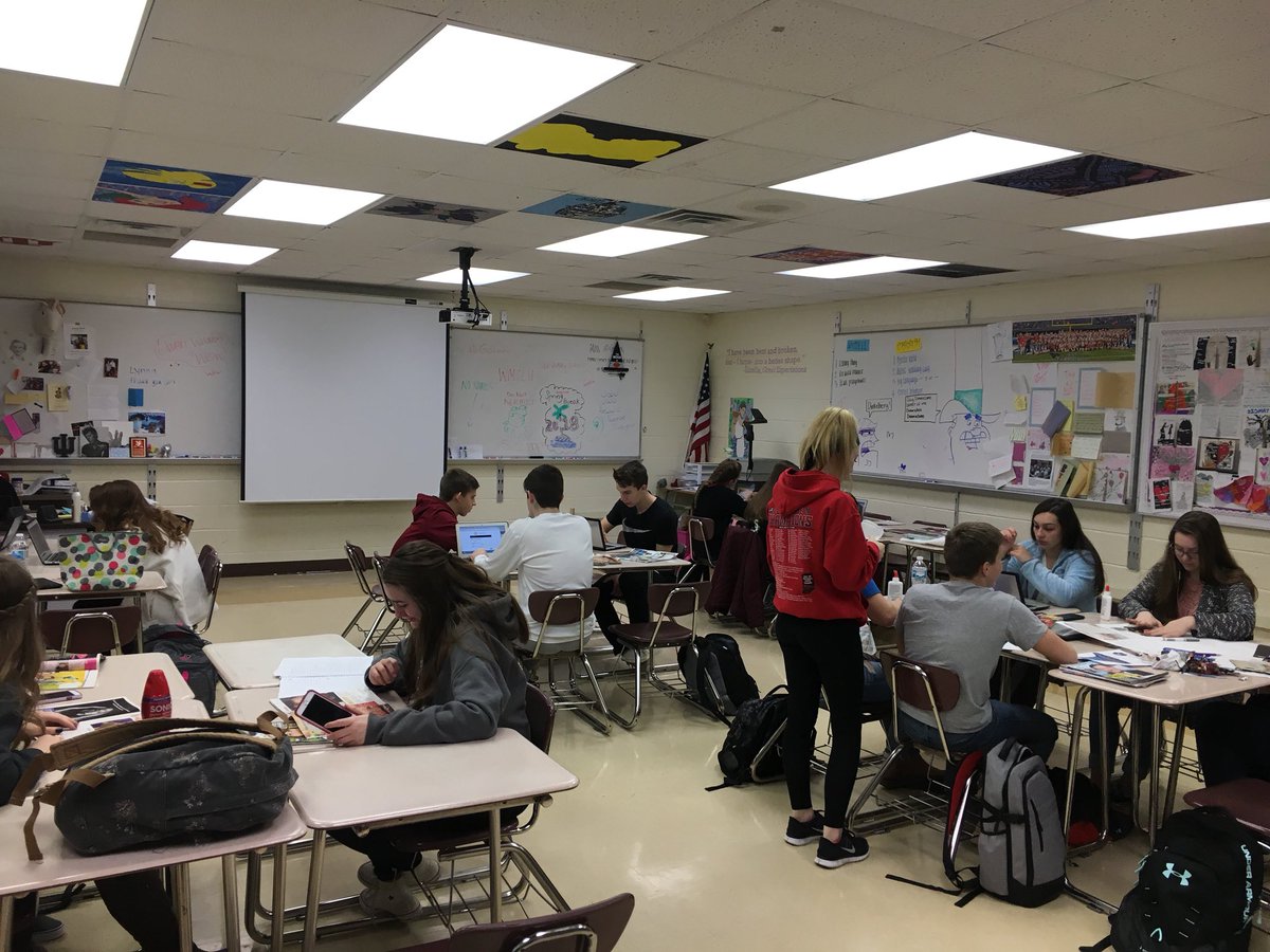 NPHSMcGovern's tweet image. Logos, Ethos, or Pathos? Freshmen hard at work deciphering which rhetorical appeals are being used in magazine ads. Loved hearing them explain their choices to each other and ask questions. #newpalproud #createextraordinary