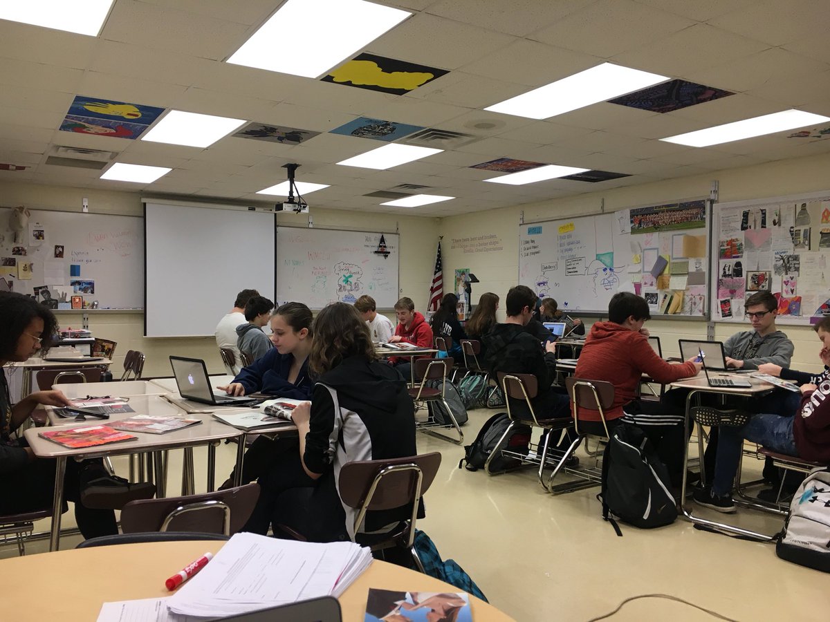 NPHSMcGovern's tweet image. Logos, Ethos, or Pathos? Freshmen hard at work deciphering which rhetorical appeals are being used in magazine ads. Loved hearing them explain their choices to each other and ask questions. #newpalproud #createextraordinary
