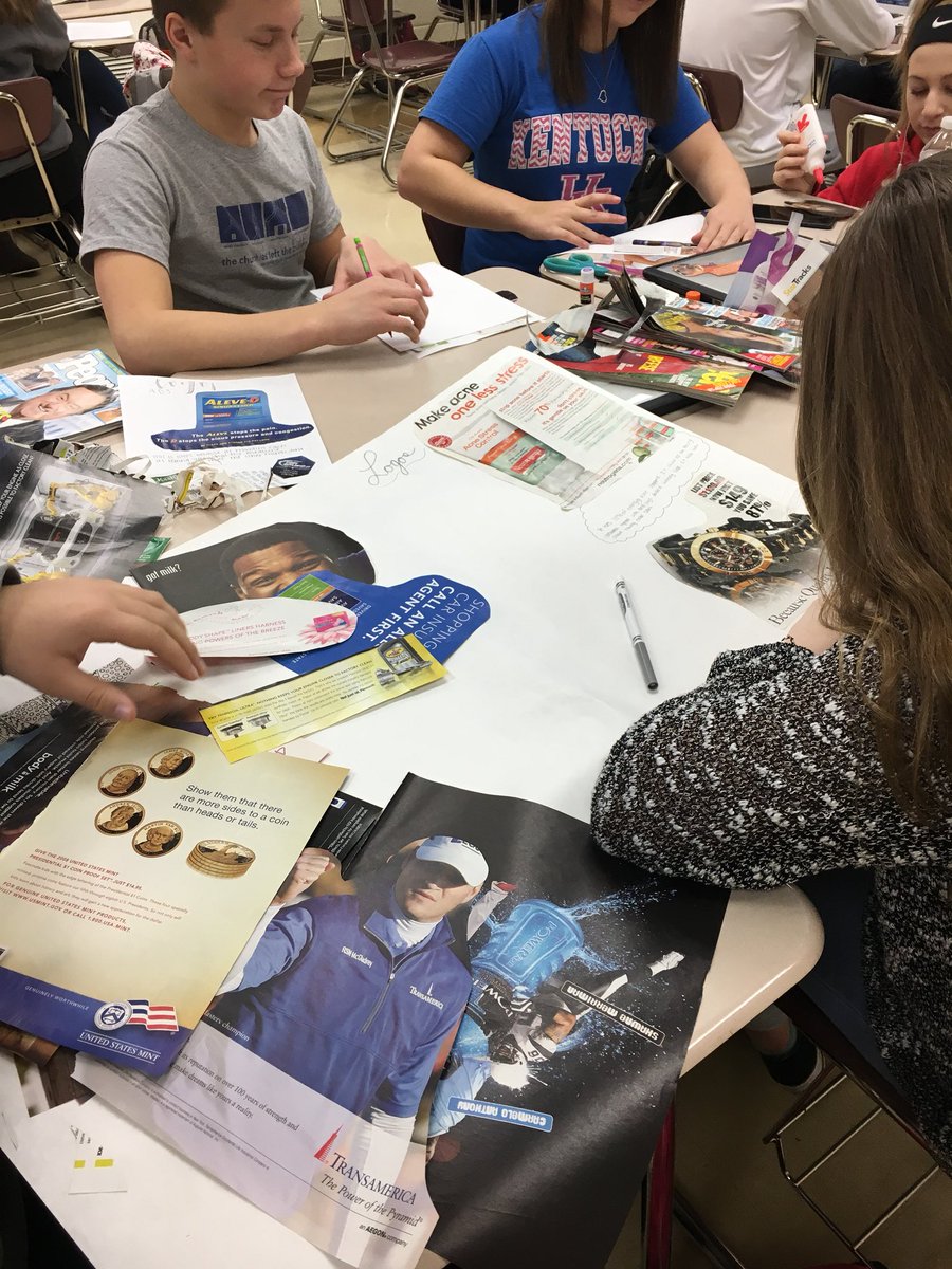 NPHSMcGovern's tweet image. Logos, Ethos, or Pathos? Freshmen hard at work deciphering which rhetorical appeals are being used in magazine ads. Loved hearing them explain their choices to each other and ask questions. #newpalproud #createextraordinary