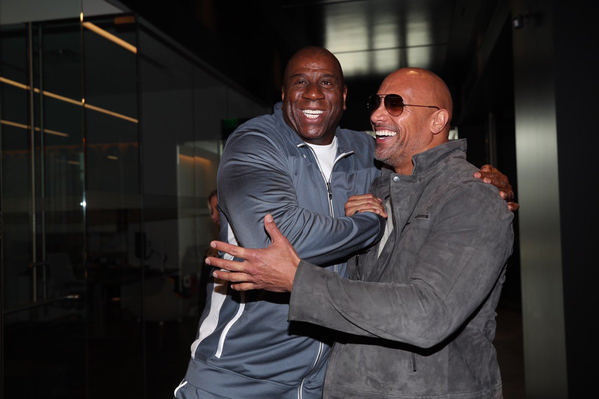 MagicJohnson's tweet photo. Thank you @TheRock for stopping by and giving our @Lakers players an inspirational message before taking the court tonight. #LakersGeniusTalks https://t.co/bwB9J57hRU