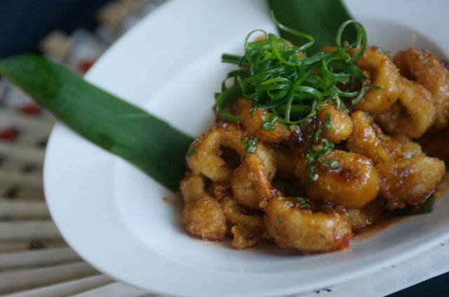 Our Chinese Style Calamari is perfectly crisp and crunchy, tossed in a sweet &amp; spicy cilantro chili sauce. There's a reason its a favorite.