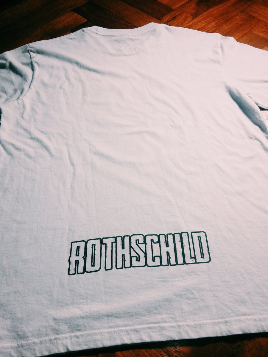 KRAS White T-shirt  “ROTHSCHILD”. 

Available Size : S, M, L, XL, XXL 
Price : RP. 125.000,-

TAG : Mad Maniac