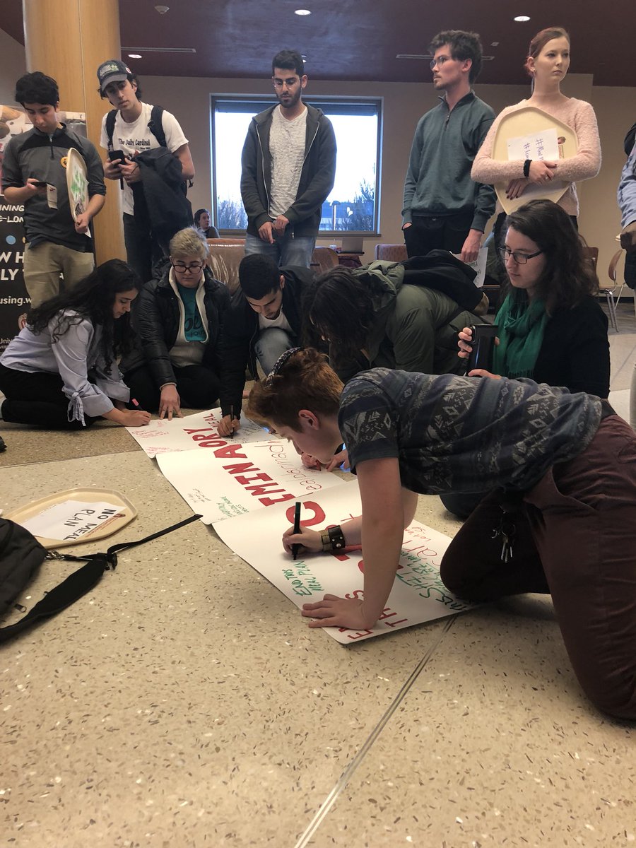 abbsdoeden's tweet photo. .@BadgerHerald Second UW student meal plan protest parades through Four Lakes Market, signsposter against plan, marches to University Housing office and hangs poster on door. https://t.co/grUZqtdnE1