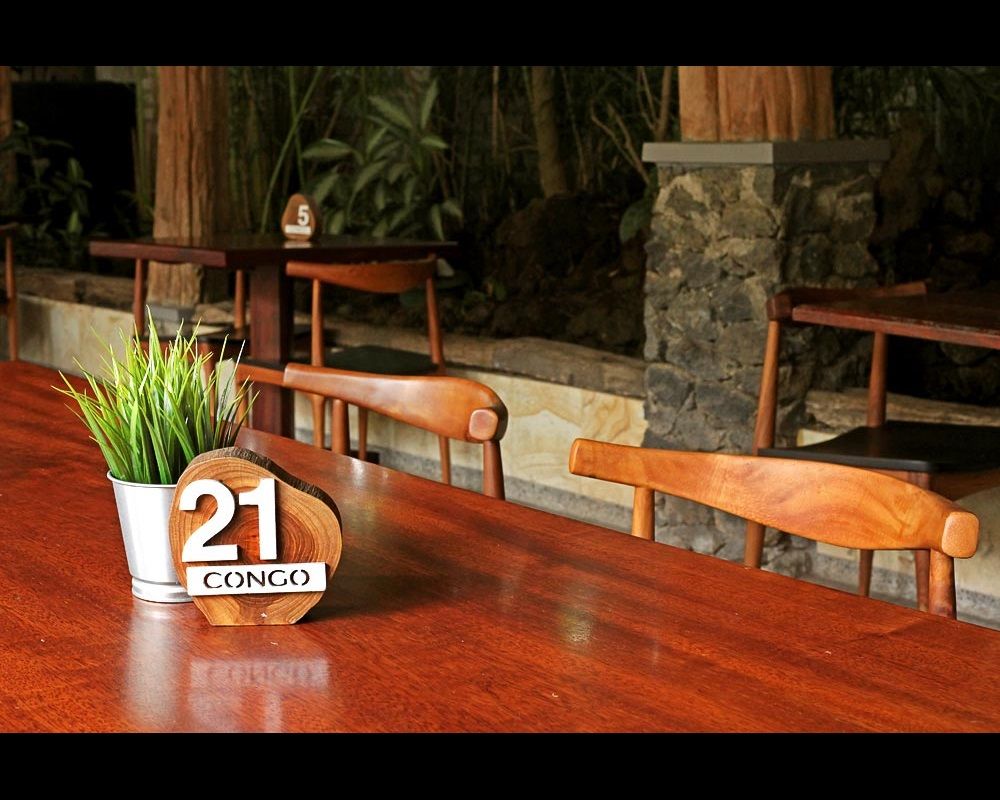 Another cozy corner of Congo Café where you can enjoy some fresh mountain air while browsing through our expansive menu...