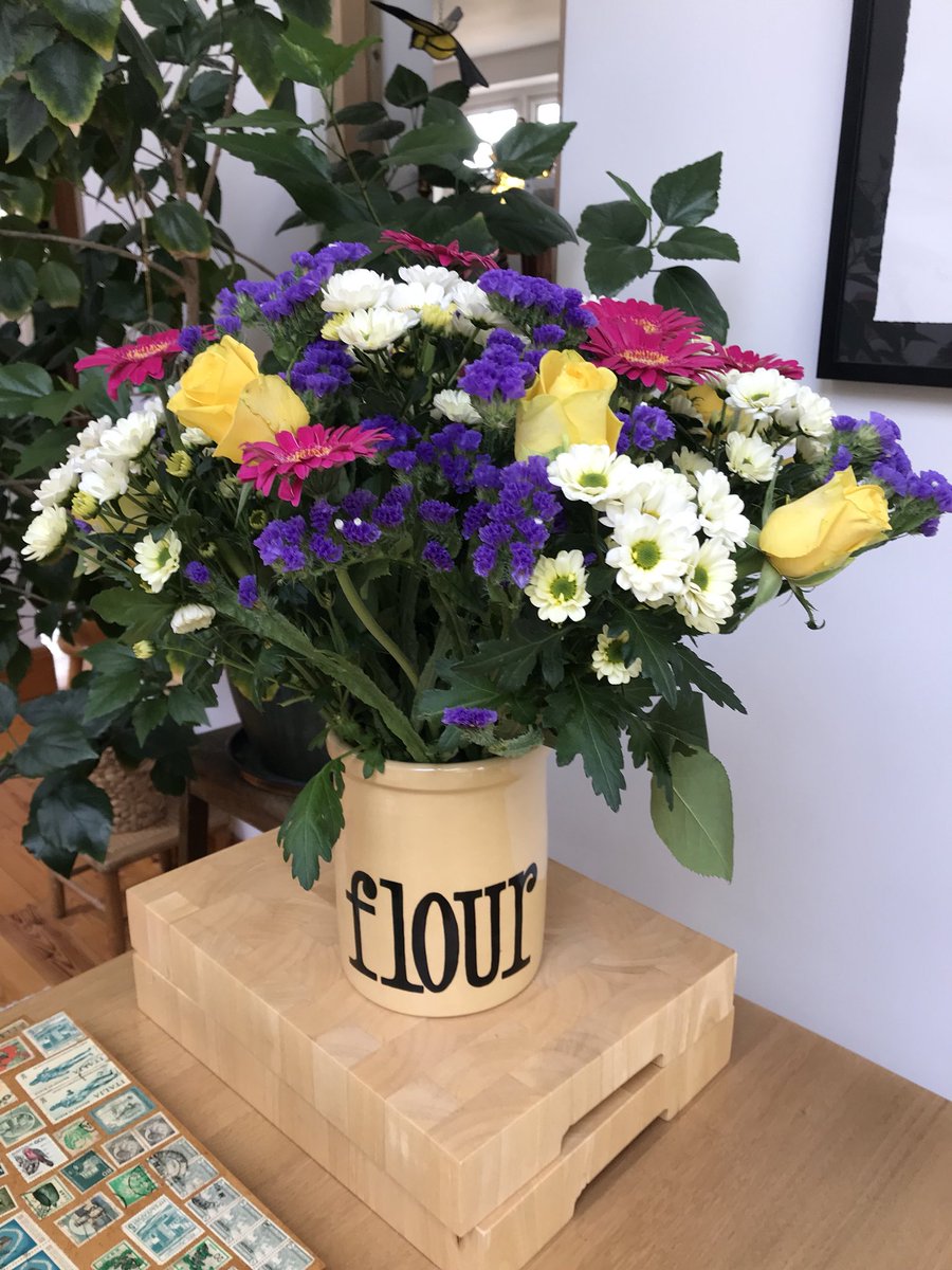Flowers in a flour pot.