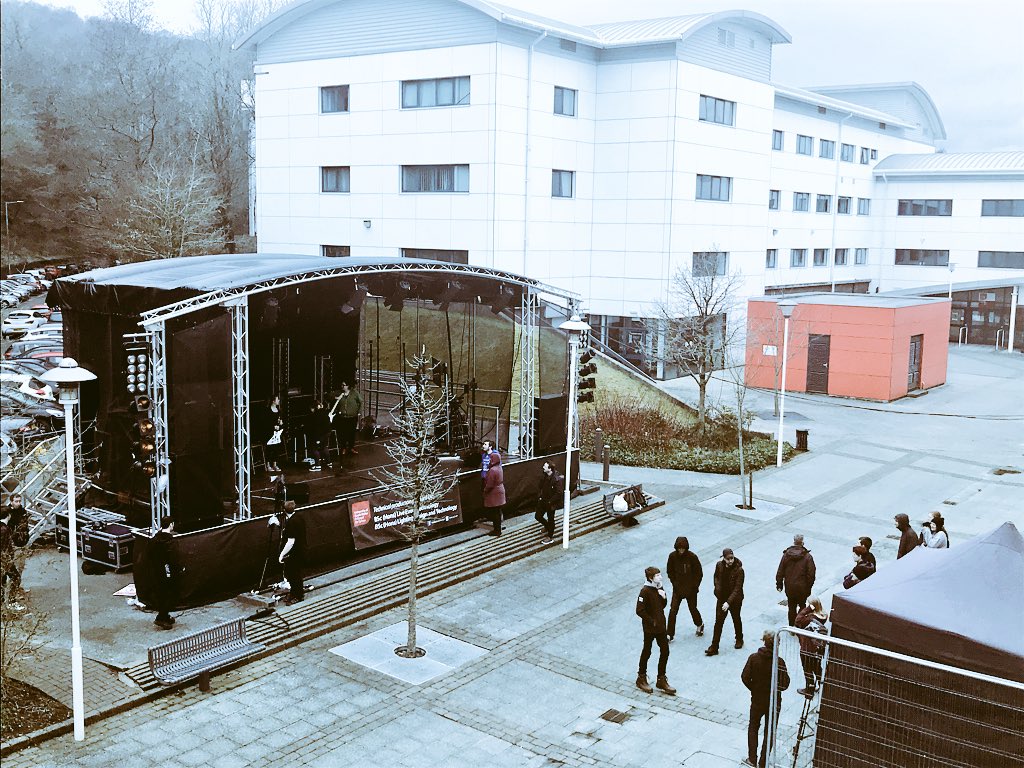USWSTEM's tweet photo. If you’re wandering around campus @UniSouthWales Treforest today, check out our stage and entertainment set up by our live event and lighting tech students 🎧🎤🎥🎶 https://t.co/8YDr46LZwq