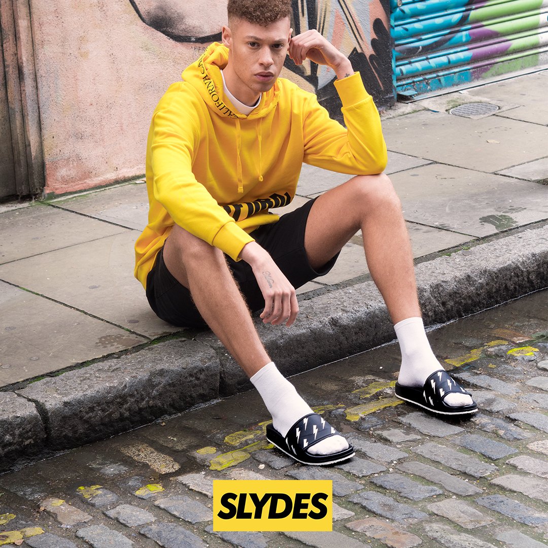 ⚡️⚡️⚡️ Lightning Bolt #Slydes - Tazer. Available in Black and White now! #sliders #footwear #shoes #shoefashion #fashion #footwearbrand