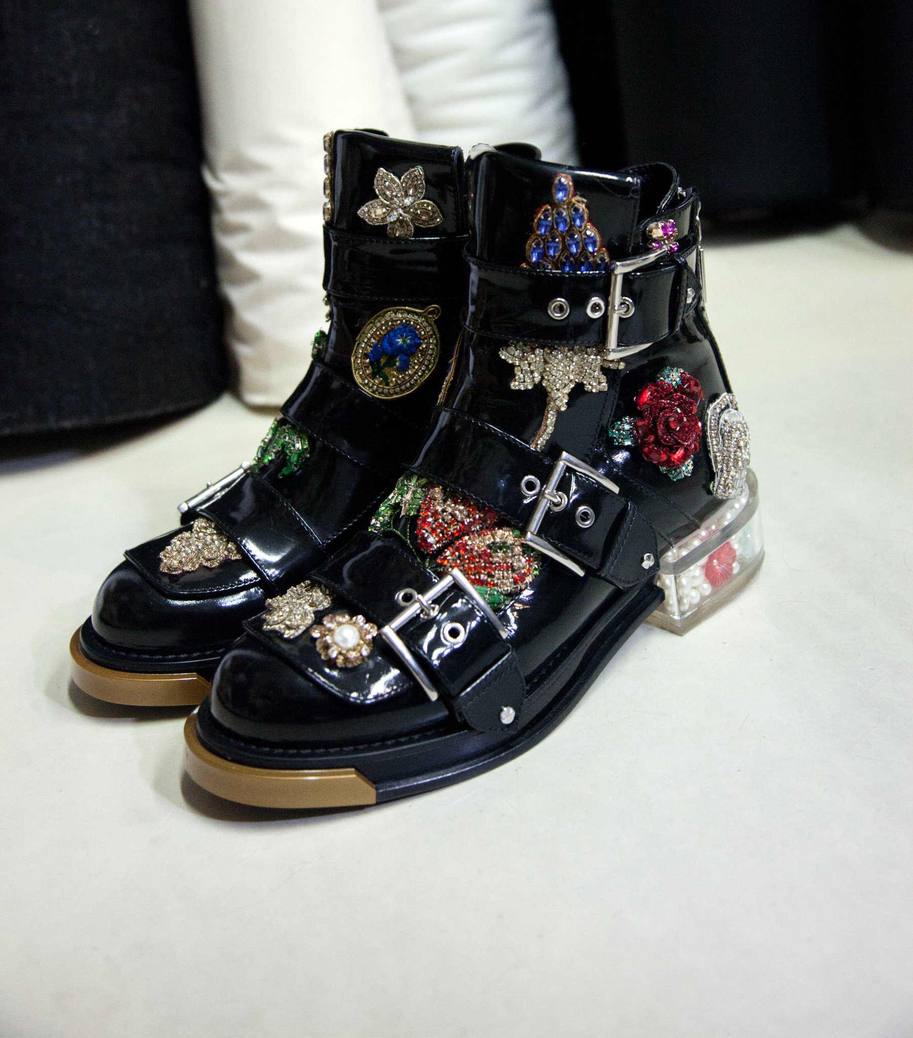 Alexander McQueen on X Three buckle boots embellished with heirloom treasure motifs a fan rose floral locket and flowers in a mix of green red and fuchsia. From the Alexander McQueen Spring Summer 201...
