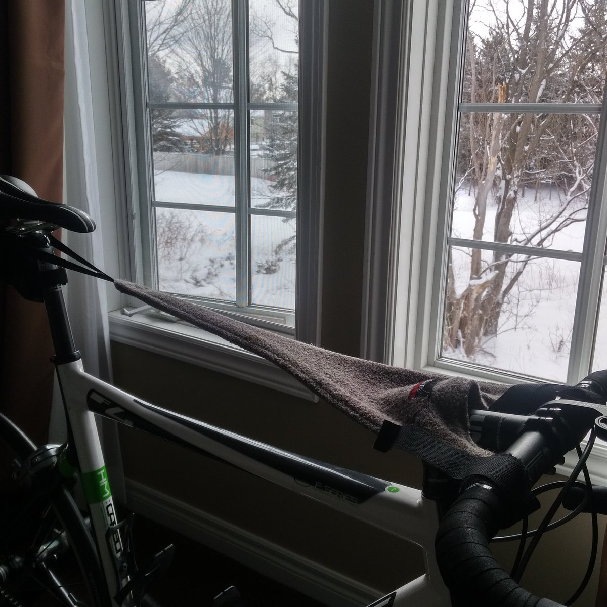 s_weldon's tweet photo. It's no southern trip @commutertutor1 @dzunic73 @WaterlooCC, but I do what I can with what I have! @GoZwift #familyskivacation #dotheshoe #dadtraining https://t.co/Yl3ux1I8jg