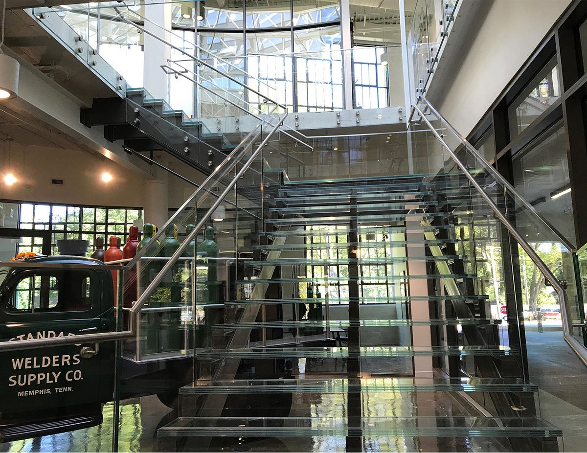 sightlinecs's tweet photo. A practically invisible staircase? With the right team and materials, anything is possible! For this installation at the @nexairllc headquarters, we provided a look that's as light as air. https://t.co/NgZiAIAaO0 @TullBrosInc @LRKinc #glassrailing https://t.co/Ak6o5TAIH9