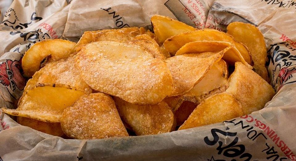 Celebrate National Chip Day right with an order of Roosters Chips, served with your favorite sauce.