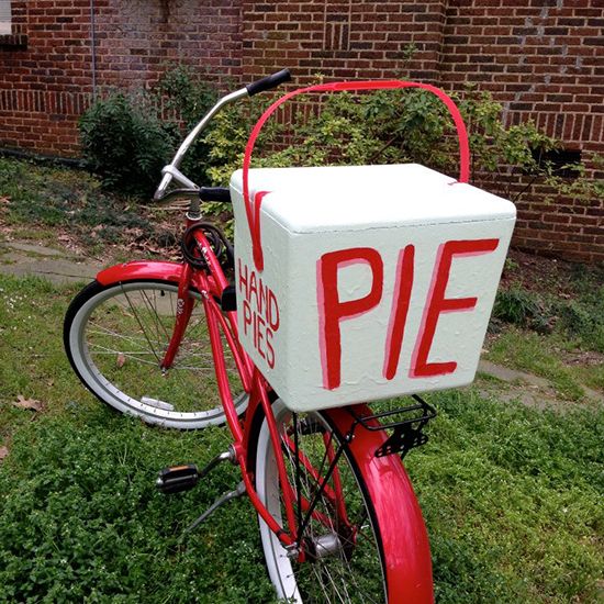 bikeshare's tweet photo. Red bike and pie. Makes you want to snag a CaBi bike to score some pie doesn't it?! #PiDay #bikeDC #cabiApp https://t.co/VeKNWKM1Om