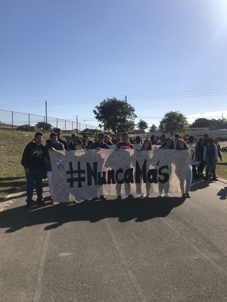 LightingTheWay6's tweet photo. @ConnistonMiddle #BlueMarlins made banners, signed them as a family, and walked around the track for 17 minutes #WalkUPnotOUT #MSDstrong #NuncaMás #NeverAgain #Enough https://t.co/tEb0WjSny8