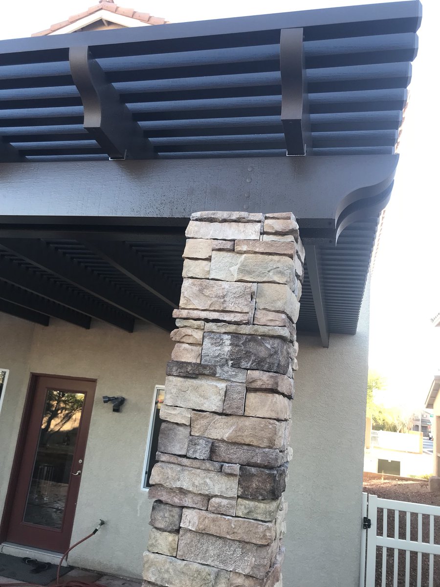 BellaPatioLV's tweet photo. Stone pillars really make a patio cover stand out, like with this this lattice, siennawood, with scalloped tails. #patiocover #patiolife #lattice #scallop #homeimprovement #architecturalphotography #aluminumpatiocovers #duralum #alumawood #BellaPatio https://t.co/V3GOHWQA5a