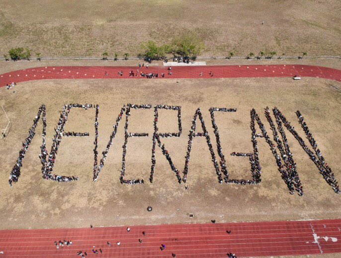 MKHS18's tweet photo. This is the drone photo from the MKHS Assembly &amp; Walkout in support of #MarjoryStonemanDouglas High following the tragic events that took place one month ago today. We thank the MSD students who came to share their #ParklandStory. Thank you all #MSDStrong #ParklandStrong https://t.co/5rKN1o5A0t