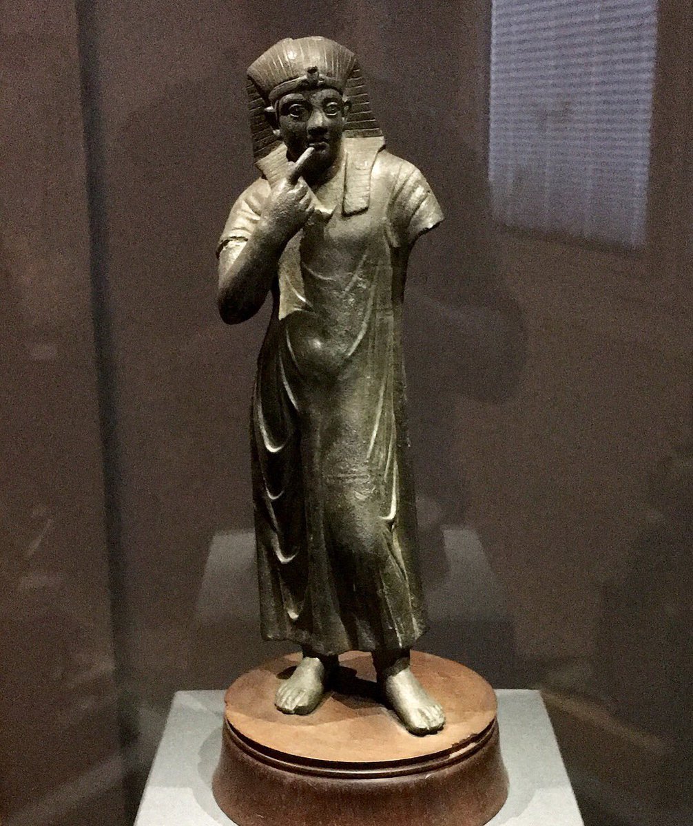 chrisnaunton's tweet photo. Love the clash of styles in Hellenistic and Roman era Egyptian art. Pharaoh’s garb but Classical style in this very fey bronze figure and a grumpy looking Caracalla. #cheerup #missingtombs #Friday #Egypt https://t.co/Z1EdtrIo9R