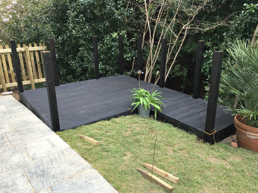 WolfContractors's tweet photo. Elevated decking install with a sub frame for strength due to height. We used composite decking, the client wanted black wood grain. This was finished with stainless post caps &amp; tensioned stainless wire rope between the posts. #homeimprovement #garden #decking #contractor #truro https://t.co/zmDiNxVXiZ
