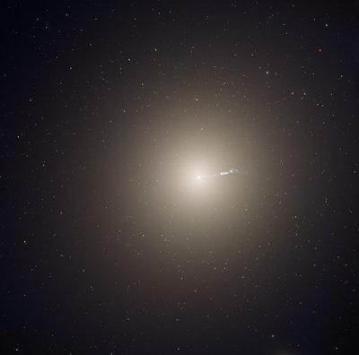 NASAHubble's tweet photo. In honor of #StephenHawking and his transformational contributions to our understanding of black holes &amp; the cosmos, we present this #HubbleClassic of a jet of subatomic particles speeding away from a supermassive black hole in elliptical galaxy M87: https://t.co/4aXcptsNA6 https://t.co/mRoGbiL81g