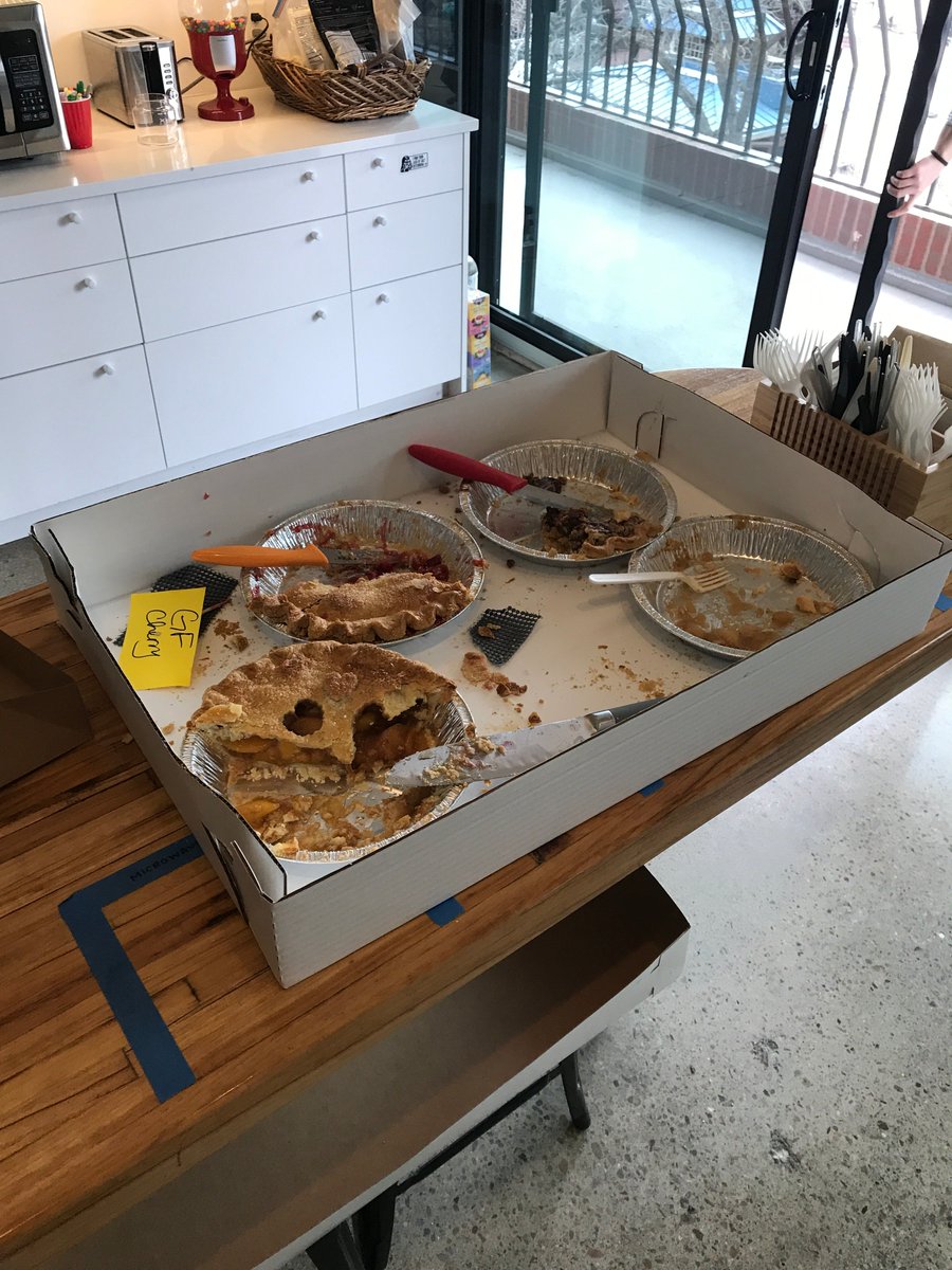 VictorOps's tweet photo. Shoutout to @ShamanesBoulder for the amaaaaazing pie on Pi Day! 🥧 As you can see, we destroyed it... #PiDay #PieDay #DesksofVO https://t.co/wF5rvpajy8