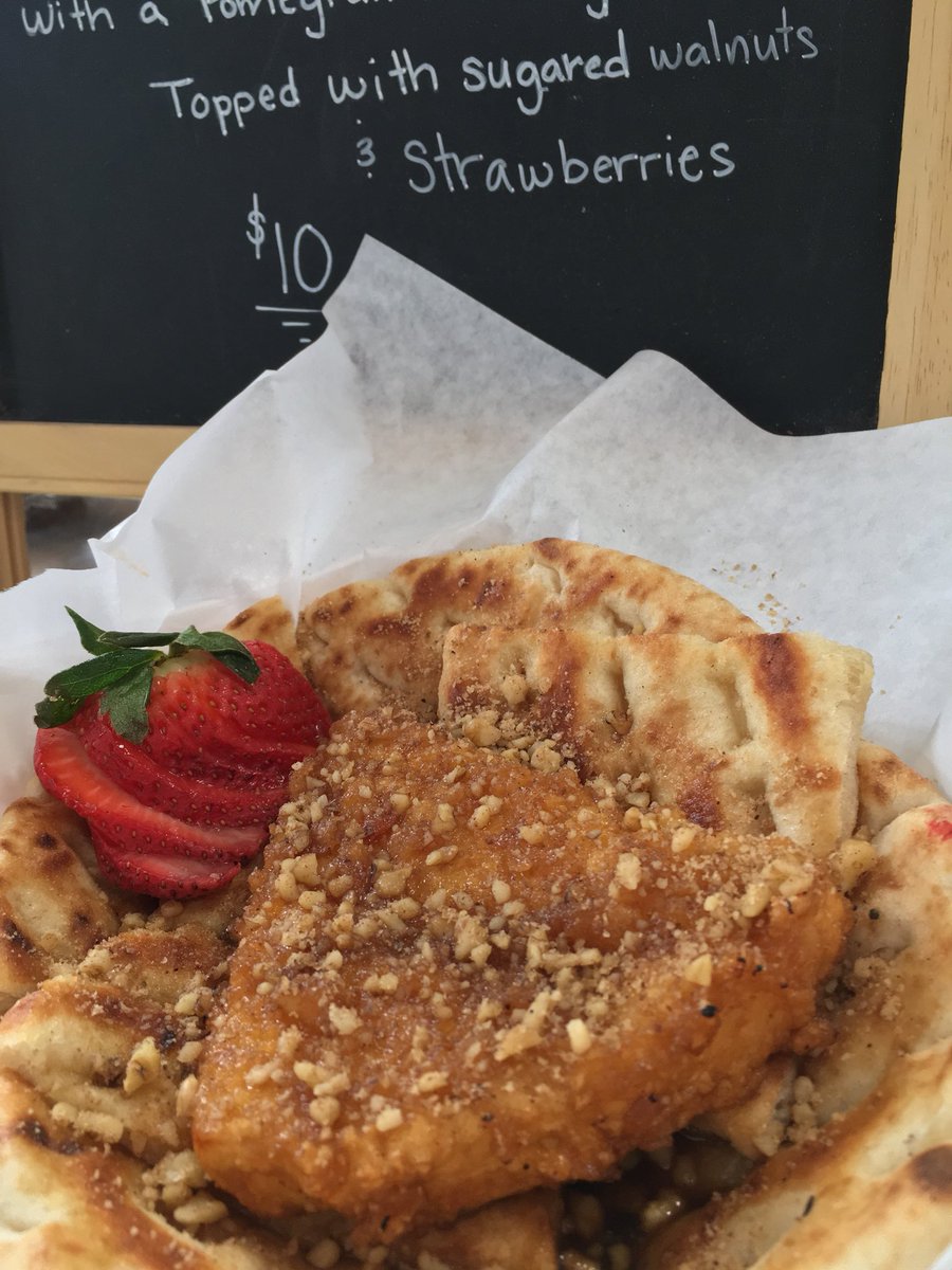 If you haven’t tried out our March Saganaki of the Month, you’re missing out! It’s a mouth-watering mix of brie, strawberries, candies walnuts, and a pomegranate honey reduction flambéed in spiced rum!