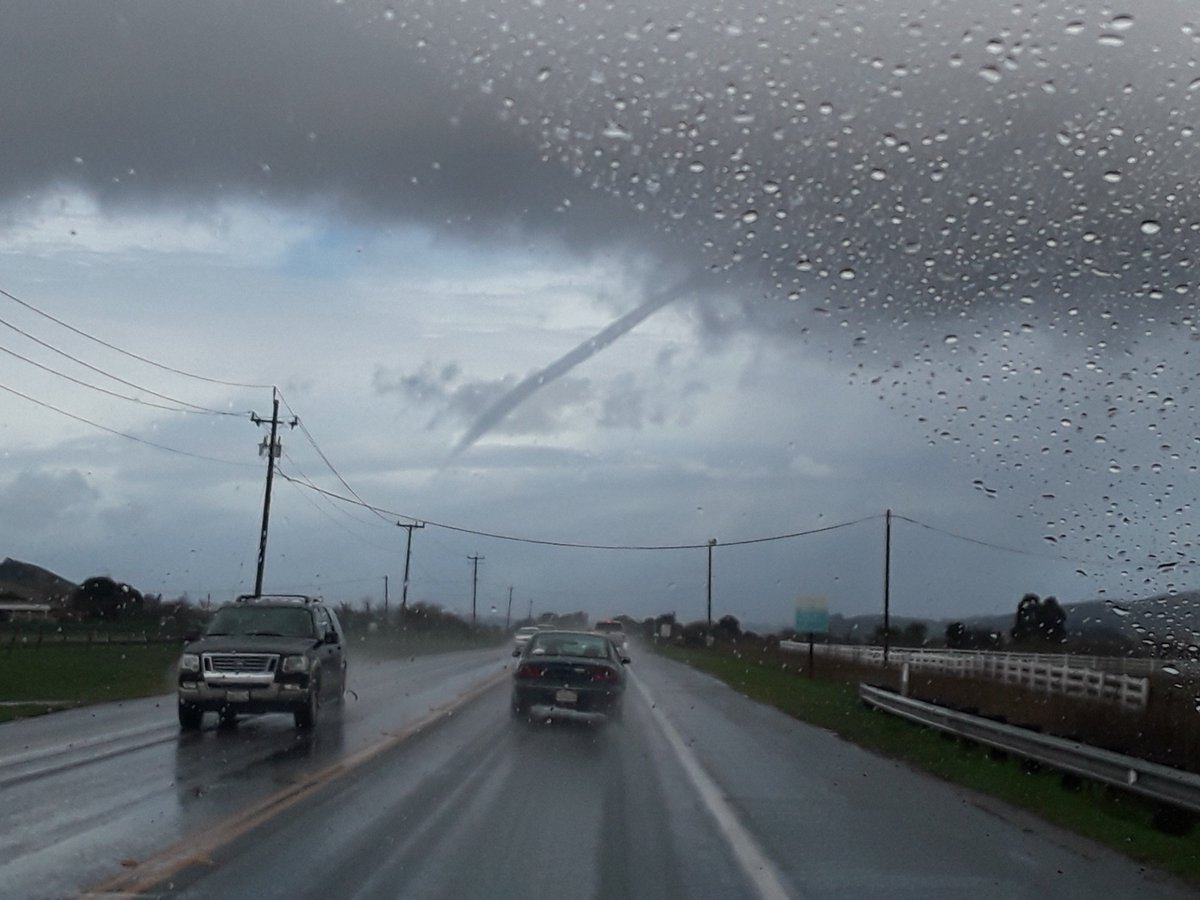PGE_John's tweet image. Jack Jones took this photo of a funnel cloud along Los Osos Valley Road looking westward toward Los Osos as an active band of convective clouds moved eastward toward #SLOWeather. There have been no reports of the funnel cloud reaching the ground and becoming a tornado. #CaWx