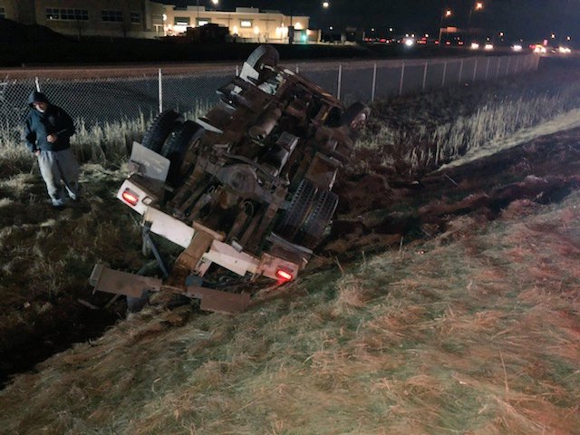 Tow truck rolled over on the ramp from QEW Niagara Bound to Fifty Road in Stoney Creek. Male driver with minor injuries. Ramp closed.  #HamOnt