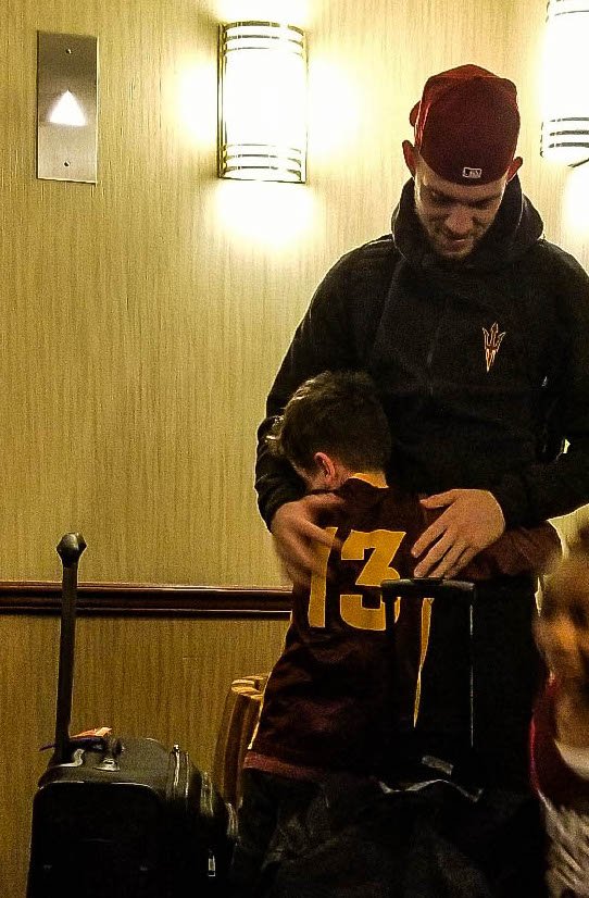 The young Sun Devil fan who appeared emotional at end of tonight's broadcast is Jacob, the son of our athletic trainer. Jacob has been friends with Kodi for the past four years. Jacob gave each of our student-athletes a hug as they returned to the hotel tonight.