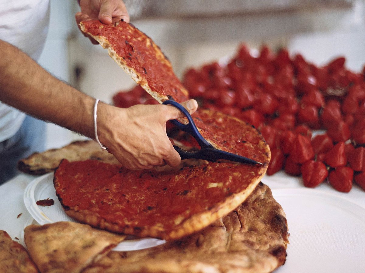 business's tweet photo. The wild pizzas of southern Italy have to be seen to be believed https://t.co/TpLP0b8KHe https://t.co/9MyBpbgsf7