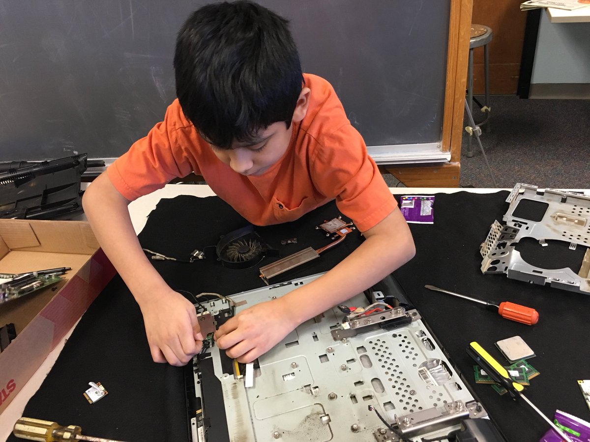 Ms_CCBryan's tweet photo. #sennettshines Look at us taking apart this old computer! Next week we’ll categorize all the parts we’ve discovered. https://t.co/2XabmjXrky