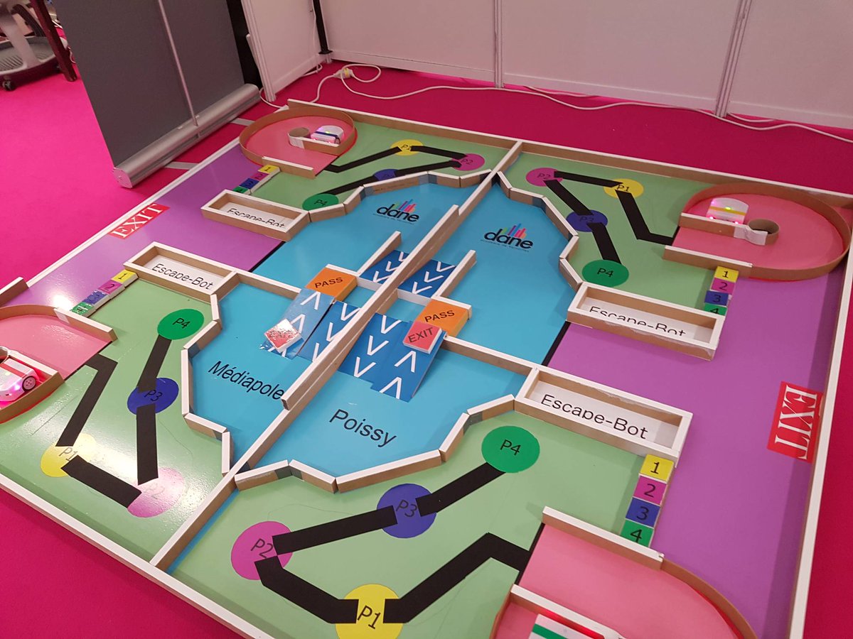 CodeWeekEU's tweet photo. Kids getting ready for #EscapeBot by @DaneVersailles a game teaching #coding remotely. #eduspot2018 https://t.co/j5IBw7cXmo