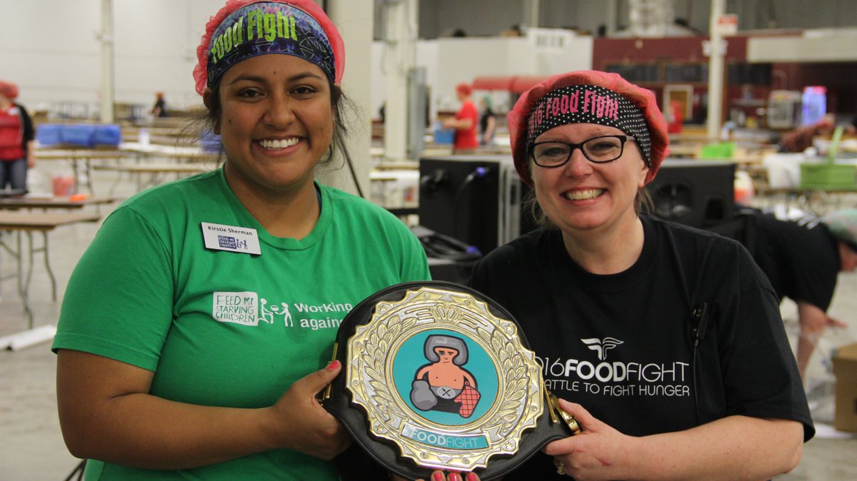 foodfightdc's tweet photo. #TBT to the 2016 Food Fight event. This is Kirstie from @fmsc_org &amp; Kim from @NHCLorton, smiling big because we hit our 5 million meal mark! #2018foodfight #fmsc #feedmystarvingchildren https://t.co/5Y8d8WM31s