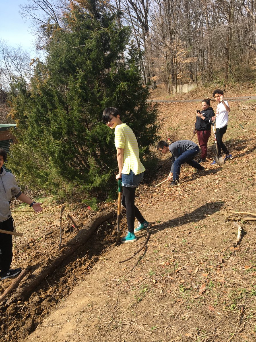 Students diggin Permaculture class! And diggin swales for the garden.