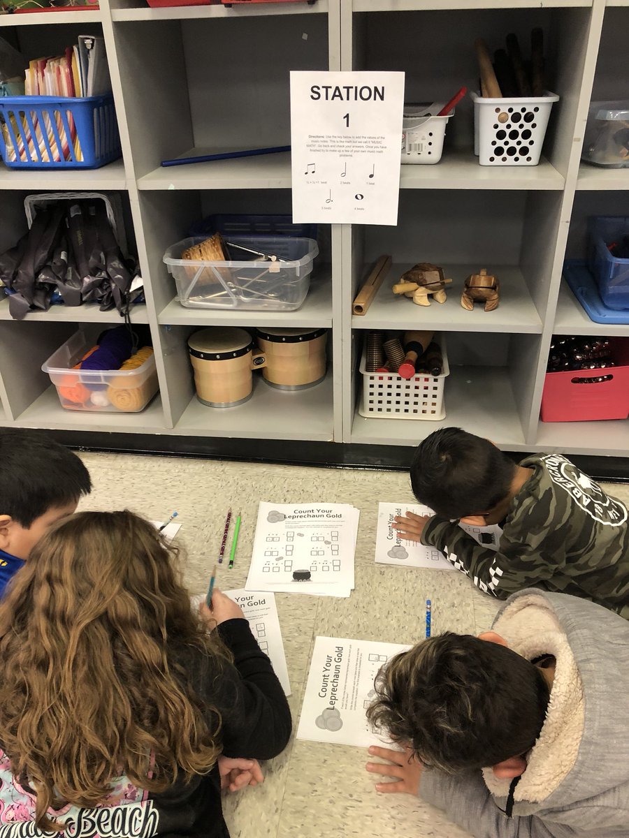 SarahC_Rickman's tweet photo. 2nd graders doing St. Patrick’s Day stations to review the concepts we have been learning in music class. #notevalues #rhythm #composition #musicopinions 🇨🇮🎶 @Smith_Seabees https://t.co/LeipA2IkQe