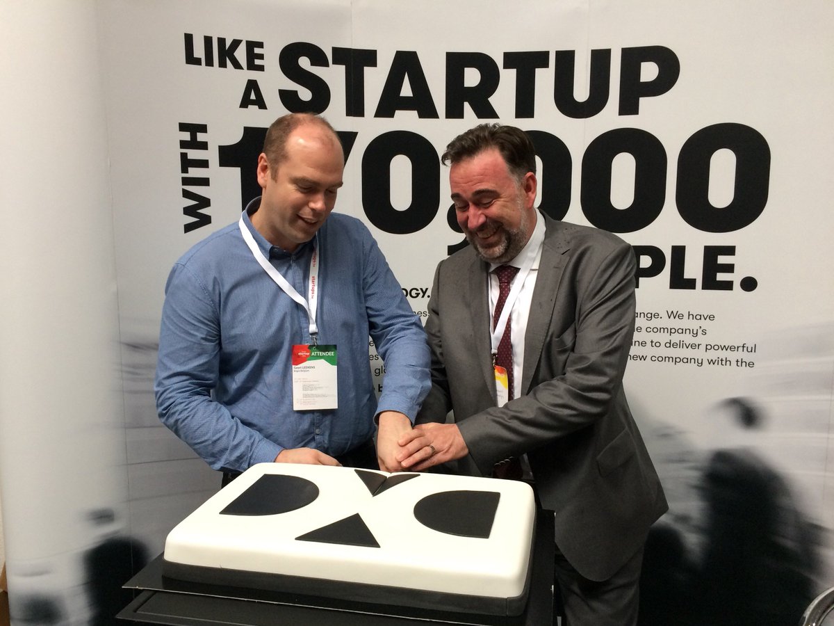 DXCbelgium's tweet photo. #TSD18: DXC Technology is celebrating its approaching first birthday with a special cake! Stop by at our booth in the Startup village! https://t.co/C8UQxU80lJ