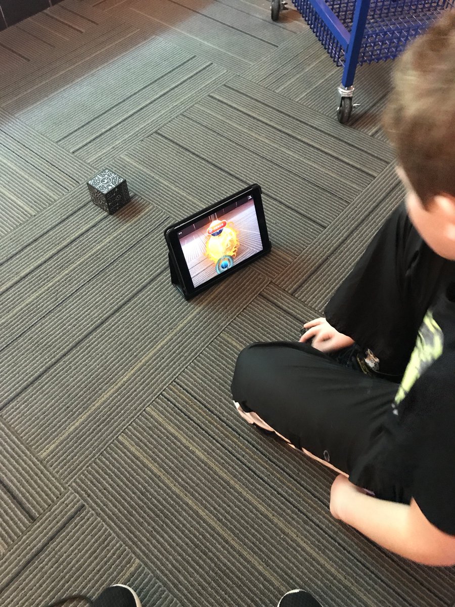 kriardinger's tweet photo. Colin brought his Merge cube while we wait for ours to arrive.  #IAmEPS https://t.co/mTZYB8cZC9