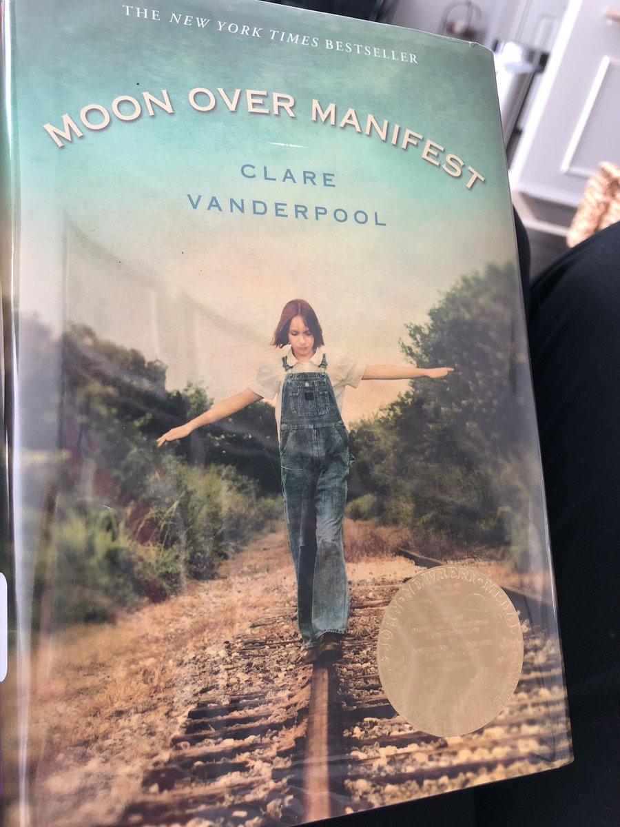 KCooperTeacher's tweet photo. I grabbed this book from the school library so I would have something to read over Spring Break, and I fell in love! #moonovermanifest https://t.co/dPgOBSvicY