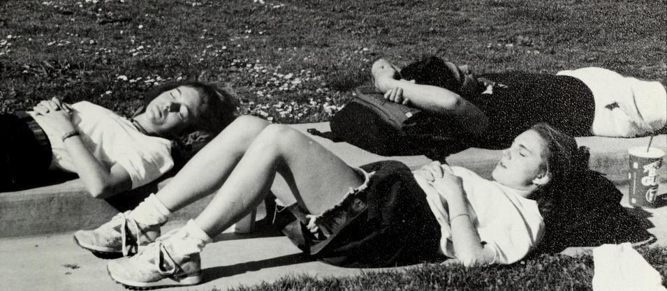 scualumni's tweet photo. #TBT: It’s week 10/dead week and students are exhausted! Not much has changed since dead week naps in the #SCUMission Gardens in 1994. https://t.co/5u863JaU4j