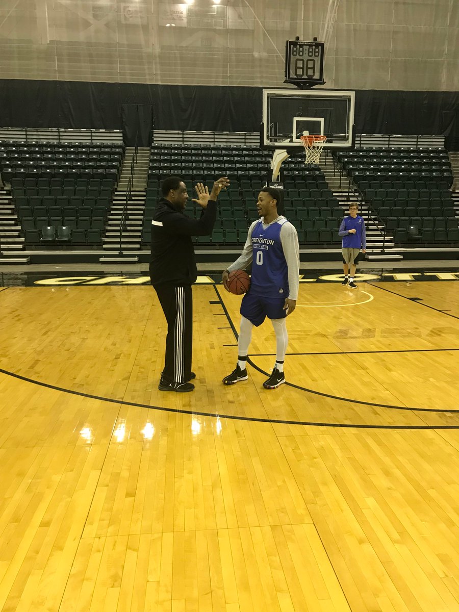 _robanderson's tweet photo. So great to have Charlotte natives Paul Silas and Tom Apke (not pictured) at practice today. Here Silas is seen working with Marcus Foster. #OnceAJay NCAAJays https://t.co/g0A5vObsSz