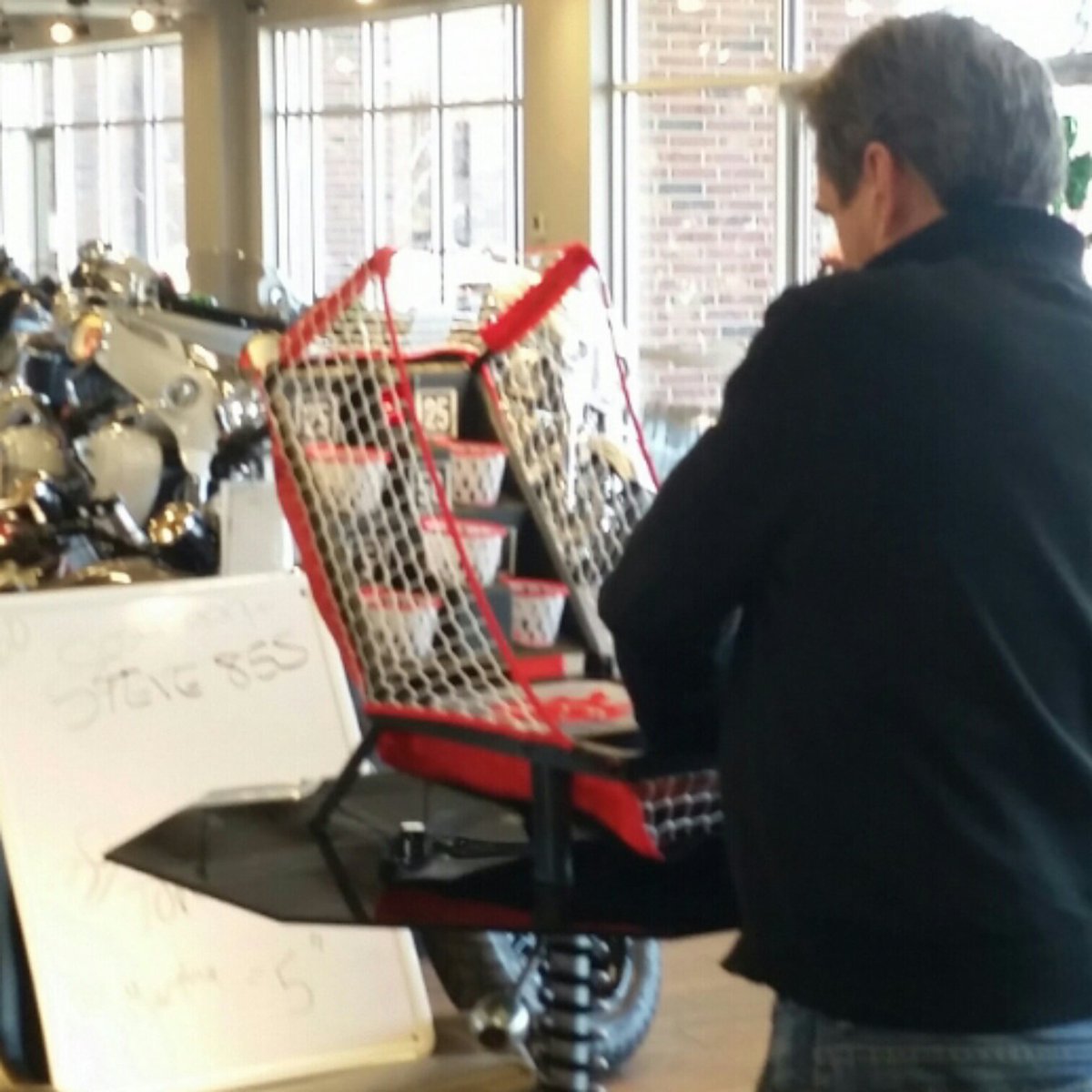 HeadIndianCoMo's tweet photo. March Mania is in full swing at Head Indian Motorcycle 🏀 See if you can beat Steve's score 😂 https://t.co/lS3Gsadtb0