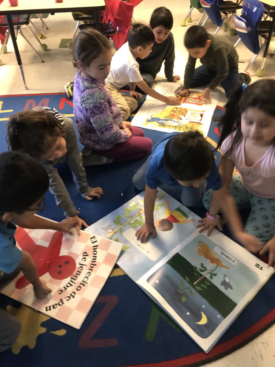 #d75TWI  students reading big books