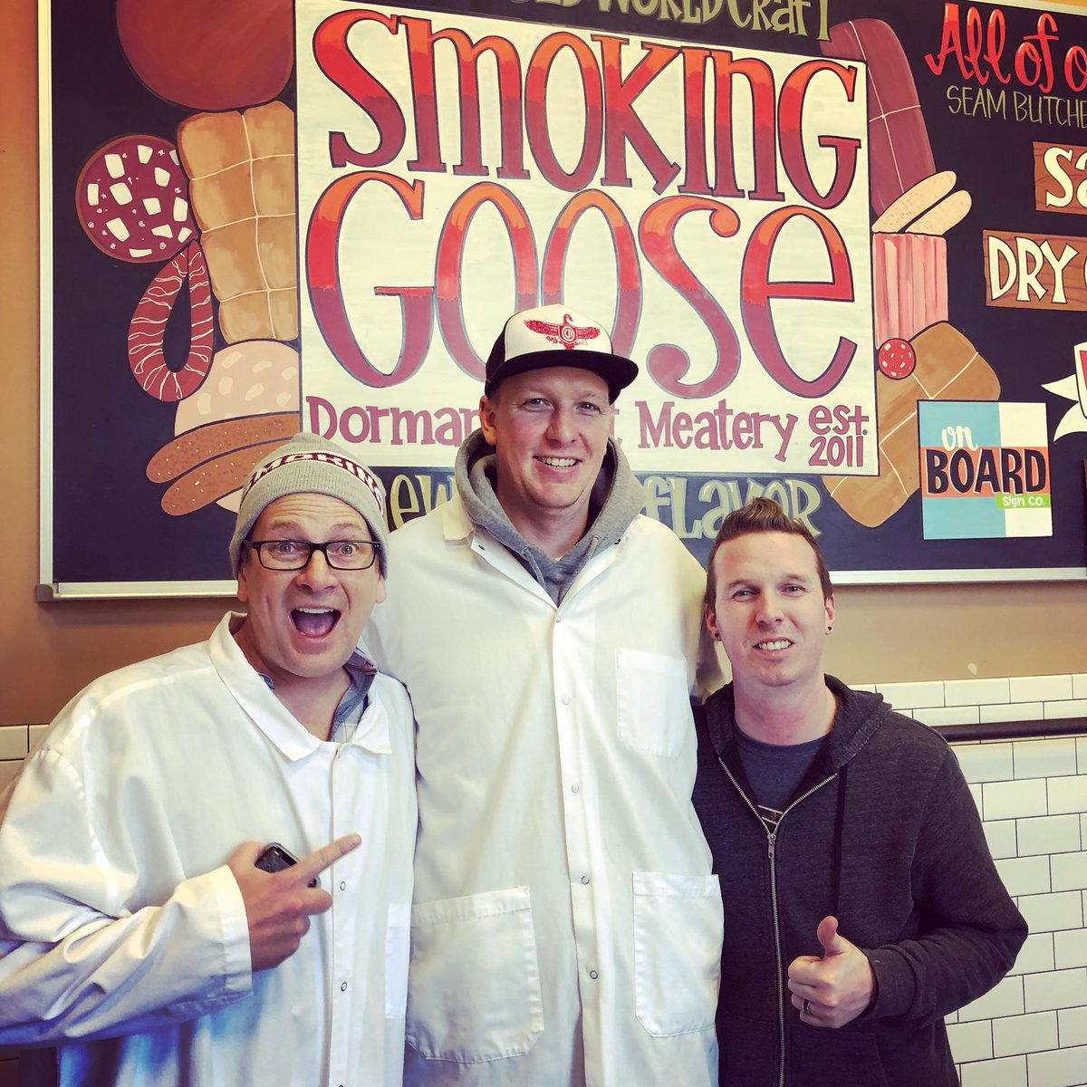 SmokingGoose's tweet photo. @smileyradioshow and #ChefAaron seeing how the sausageโs made โ thanks for visiting our #DormanStreet #MeatLocker! https://t.co/ZUQyqhMz1V