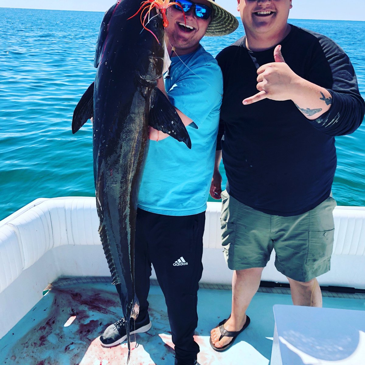 Orangebeachfish's tweet photo. Capt Ben and the Water Dog crew landing a fine cobia today. https://t.co/Rs1Yq8HvXY