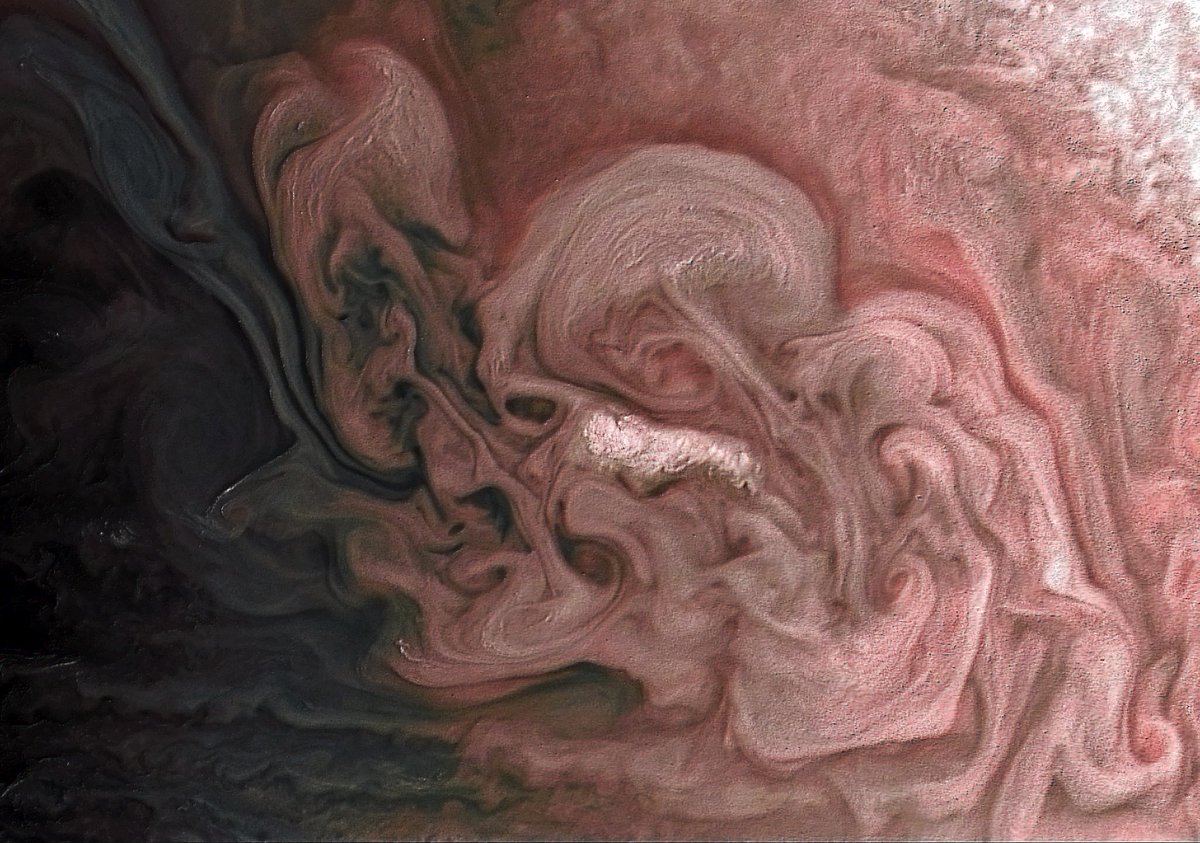 Everything's coming up roses. See a close-up view of a storm with bright cloud tops in this rose-colored view of #Jupiter. missionjuno.swri.edu/news/rose-colo…