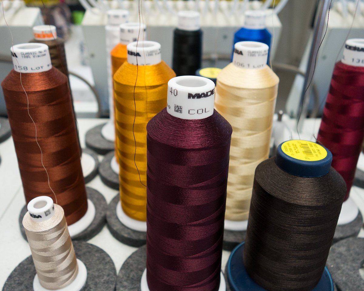Thread is loaded on the machine; it is time to embroider! #embroidery #thread #chicoca #customapparel