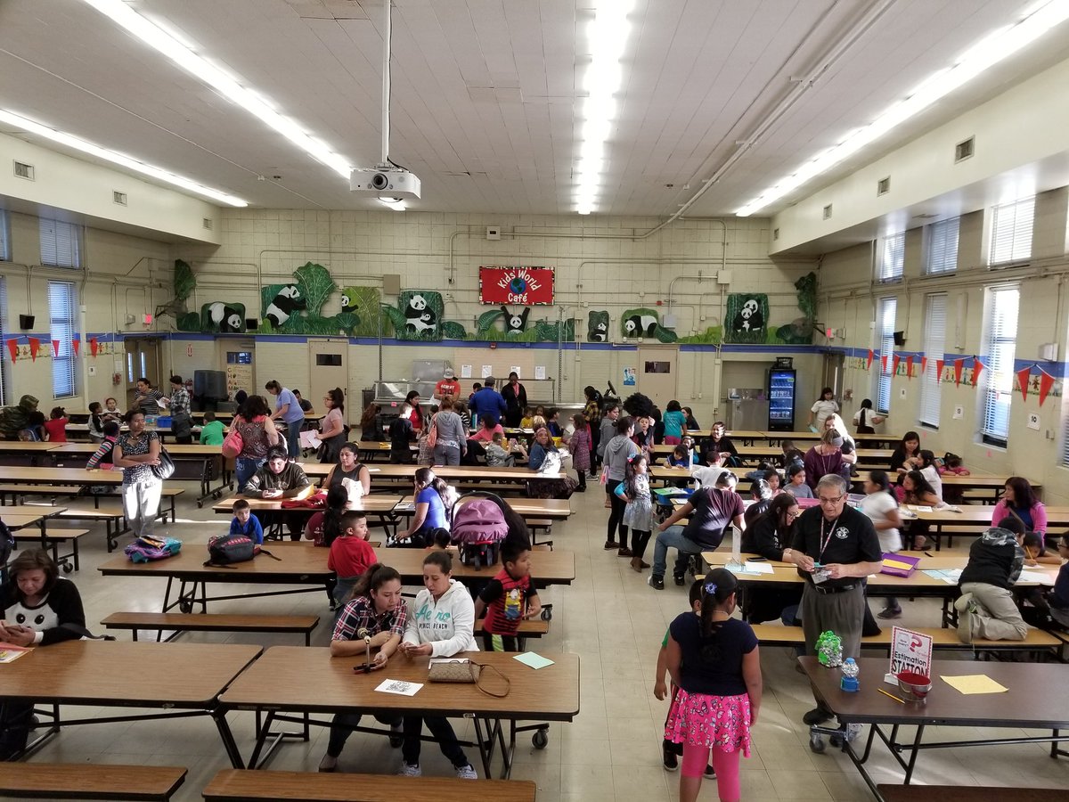 mathpandas's tweet photo. #TodayatSJE Look at all the parents and students that came to Math Night! https://t.co/gAsS5kkGl0