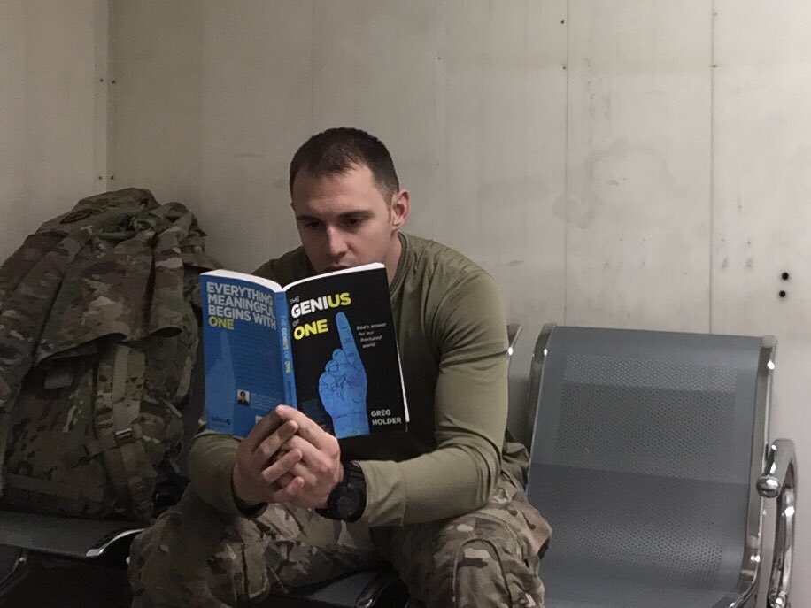 RonRigdon's tweet photo. Hey @gbholder I’ve been meaning to share this with you! My boy, Captain Rigdon, doing some reading at the airfield in Bagram, Afghanistan. #TheGeniusOfOne @crossingstl https://t.co/RpdQbIFgbA