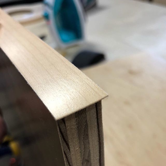 Doing a little edge banding today. I really enjoy the process! So far I have been simply using a razor blade to trim the excess and then even it out with a pass of a block plane. Am I missing out by not using one of those nifty trimmers? #cabinetmaking #… bit.ly/2IqvvyG